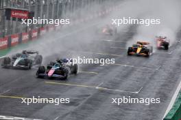 Pierre Gasly (FRA) Alpine F1 Team A524 and George Russell (GBR) Mercedes AMG F1 W15. 03.11.2024. Formula 1 World Championship, Rd 21, Brazilian Grand Prix, Sao Paulo, Brazil, Race Day.