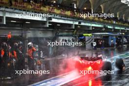 George Russell (GBR) Mercedes AMG F1 W15 leaves the pits ahead of Lando Norris (GBR) McLaren MCL38. 03.11.2024. Formula 1 World Championship, Rd 21, Brazilian Grand Prix, Sao Paulo, Brazil, Race Day.