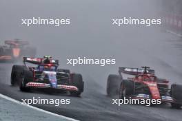 Yuki Tsunoda (JPN) RB VCARB 01 and Charles Leclerc (MON) Ferrari SF-24 battle for position. 03.11.2024. Formula 1 World Championship, Rd 21, Brazilian Grand Prix, Sao Paulo, Brazil, Race Day.