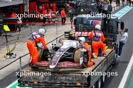 The Haas VF-24 of Sprint retiree Nico Hulkenberg (GER) Haas F1 Team is recovered back to the pits on the back of a truck. 02.11.2024. Formula 1 World Championship, Rd 21, Brazilian Grand Prix, Sao Paulo, Brazil, Sprint and Qualifying Day.