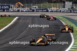 Oscar Piastri (AUS) McLaren MCL38 leads at the start of Sprint. 02.11.2024. Formula 1 World Championship, Rd 21, Brazilian Grand Prix, Sao Paulo, Brazil, Sprint and Qualifying Day.