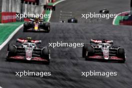 Nico Hulkenberg (GER) Haas VF-24 and Oliver Bearman (GBR) Haas VF-24 Reserve Driver battle for position. 02.11.2024. Formula 1 World Championship, Rd 21, Brazilian Grand Prix, Sao Paulo, Brazil, Sprint and Qualifying Day.