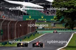 Max Verstappen (NLD) Red Bull Racing RB20 and Charles Leclerc (MON) Ferrari SF-24 battle for position. 02.11.2024. Formula 1 World Championship, Rd 21, Brazilian Grand Prix, Sao Paulo, Brazil, Sprint and Qualifying Day.