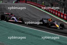 Liam Lawson (NZL) RB VCARB 01 and Sergio Perez (MEX) Red Bull Racing RB20 battle for position. 02.11.2024. Formula 1 World Championship, Rd 21, Brazilian Grand Prix, Sao Paulo, Brazil, Sprint and Qualifying Day.