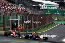 Max Verstappen (NLD) Red Bull Racing RB20 passes Charles Leclerc (MON) Ferrari SF-24. 02.11.2024. Formula 1 World Championship, Rd 21, Brazilian Grand Prix, Sao Paulo, Brazil, Sprint and Qualifying Day.