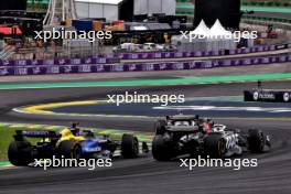 Alexander Albon (THA) Williams Racing FW46 and Nico Hulkenberg (GER) Haas VF-24 battle for position. 02.11.2024. Formula 1 World Championship, Rd 21, Brazilian Grand Prix, Sao Paulo, Brazil, Sprint and Qualifying Day.