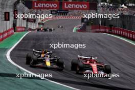 Max Verstappen (NLD) Red Bull Racing RB20 and Charles Leclerc (MON) Ferrari SF-24 battle for position. 02.11.2024. Formula 1 World Championship, Rd 21, Brazilian Grand Prix, Sao Paulo, Brazil, Sprint and Qualifying Day.