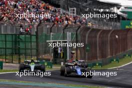 Franco Colapinto (ARG) Williams Racing FW46 and Lewis Hamilton (GBR) Mercedes AMG F1 W15 battle for position. 02.11.2024. Formula 1 World Championship, Rd 21, Brazilian Grand Prix, Sao Paulo, Brazil, Sprint and Qualifying Day.