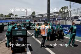 Fernando Alonso (ESP) Aston Martin F1 Team AMR24 and Lance Stroll (CDN) Aston Martin F1 Team AMR24 starting Sprint from the pit lane. 02.11.2024. Formula 1 World Championship, Rd 21, Brazilian Grand Prix, Sao Paulo, Brazil, Sprint and Qualifying Day.