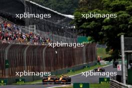 Lando Norris (GBR) McLaren MCL38 passes Oscar Piastri (AUS) McLaren MCL38 to take the lead. 02.11.2024. Formula 1 World Championship, Rd 21, Brazilian Grand Prix, Sao Paulo, Brazil, Sprint and Qualifying Day.