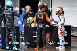 Qualifying top three in parc ferme (L to R): George Russell (GBR) Mercedes AMG F1, second; Lando Norris (GBR) McLaren, pole position; Yuki Tsunoda (JPN) RB, third. 03.11.2024. Formula 1 World Championship, Rd 21, Brazilian Grand Prix, Sao Paulo, Brazil, Race Day.