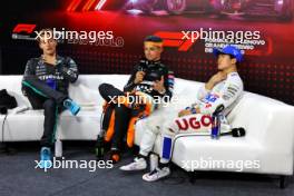 (L to R): George Russell (GBR) Mercedes AMG F1; Lando Norris (GBR) McLaren; and Yuki Tsunoda (JPN) RB, in the post qualifying FIA Press Conference. 03.11.2024. Formula 1 World Championship, Rd 21, Brazilian Grand Prix, Sao Paulo, Brazil, Race Day.