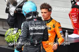 Pole sitter Lando Norris (GBR) McLaren (Right) in qualifying parc ferme with second placed George Russell (GBR) Mercedes AMG F1. 03.11.2024. Formula 1 World Championship, Rd 21, Brazilian Grand Prix, Sao Paulo, Brazil, Race Day.