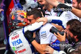 Yuki Tsunoda (JPN) RB celebrates his third position in qualifying parc ferme with the team. 03.11.2024. Formula 1 World Championship, Rd 21, Brazilian Grand Prix, Sao Paulo, Brazil, Race Day.