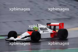 Lewis Hamilton drives Ayrton Senna's 1990 title winning car 03.11.2024. Formula 1 World Championship, Rd 21, Brazilian Grand Prix, Sao Paulo, Brazil, Race Day.