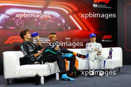 (L to R): George Russell (GBR) Mercedes AMG F1; Lando Norris (GBR) McLaren; and Yuki Tsunoda (JPN) RB, in the post qualifying FIA Press Conference. 03.11.2024. Formula 1 World Championship, Rd 21, Brazilian Grand Prix, Sao Paulo, Brazil, Race Day.