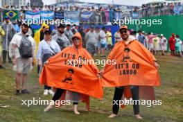 Circuit atmosphere - fans with Lando Norris (GBR) McLaren ponchos. 03.11.2024. Formula 1 World Championship, Rd 21, Brazilian Grand Prix, Sao Paulo, Brazil, Race Day.