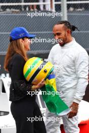 Lewis Hamilton (GBR) Mercedes AMG F1 with Viviane Senna (BRA) - McLaren MP4/5B - demonstration run. 03.11.2024. Formula 1 World Championship, Rd 21, Brazilian Grand Prix, Sao Paulo, Brazil, Race Day.