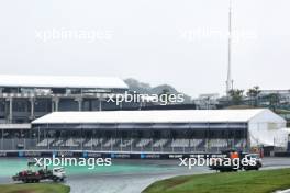 The Williams Racing FW46s of Alexander Albon (THA) and Franco Colapinto (ARG) are recovered back to the pits on the backs of trucks after they crashed during qualifying. 03.11.2024. Formula 1 World Championship, Rd 21, Brazilian Grand Prix, Sao Paulo, Brazil, Race Day.