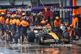 Lando Norris (GBR) McLaren MCL38 makes a pit stop. 03.11.2024. Formula 1 World Championship, Rd 21, Brazilian Grand Prix, Sao Paulo, Brazil, Race Day.