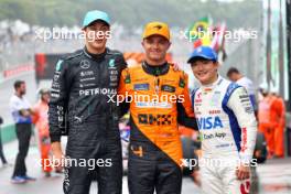 Qualifying top three in parc ferme (L to R): George Russell (GBR) Mercedes AMG F1, second; Lando Norris (GBR) McLaren, pole position; Yuki Tsunoda (JPN) RB, third. 03.11.2024. Formula 1 World Championship, Rd 21, Brazilian Grand Prix, Sao Paulo, Brazil, Race Day.