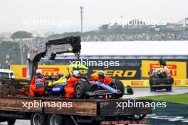 The Williams Racing FW46s of Alexander Albon (THA) and Franco Colapinto (ARG) are recovered back to the pits on the backs of trucks after they crashed during qualifying. 03.11.2024. Formula 1 World Championship, Rd 21, Brazilian Grand Prix, Sao Paulo, Brazil, Race Day.