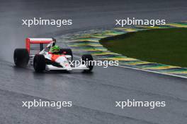 Lewis Hamilton drives Ayrton Senna's 1990 title winning car 03.11.2024. Formula 1 World Championship, Rd 21, Brazilian Grand Prix, Sao Paulo, Brazil, Race Day.