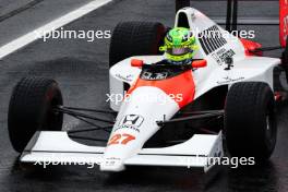 Lewis Hamilton drives Ayrton Senna's 1990 title winning car 03.11.2024. Formula 1 World Championship, Rd 21, Brazilian Grand Prix, Sao Paulo, Brazil, Race Day.