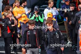 (L to R): Oliver Bearman (GBR) Haas F1 Team Reserve Driver and George Russell (GBR) Mercedes AMG F1 on the drivers' parade. 03.11.2024. Formula 1 World Championship, Rd 21, Brazilian Grand Prix, Sao Paulo, Brazil, Race Day.