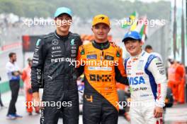 Qualifying top three in parc ferme (L to R): George Russell (GBR) Mercedes AMG F1, second; Lando Norris (GBR) McLaren, pole position; Yuki Tsunoda (JPN) RB, third. 03.11.2024. Formula 1 World Championship, Rd 21, Brazilian Grand Prix, Sao Paulo, Brazil, Race Day.