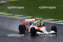 Lewis Hamilton drives Ayrton Senna's 1990 title winning car 03.11.2024. Formula 1 World Championship, Rd 21, Brazilian Grand Prix, Sao Paulo, Brazil, Race Day.