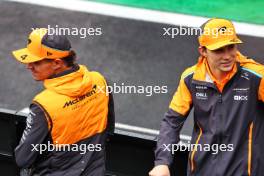 (L to R): Lando Norris (GBR) McLaren and Oscar Piastri (AUS) McLaren on the drivers' parade. 03.11.2024. Formula 1 World Championship, Rd 21, Brazilian Grand Prix, Sao Paulo, Brazil, Race Day.