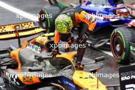 Pole sitter Lando Norris (GBR) McLaren MCL38 and third placed Yuki Tsunoda (JPN) RB VCARB 01 in qualifying parc ferme. 03.11.2024. Formula 1 World Championship, Rd 21, Brazilian Grand Prix, Sao Paulo, Brazil, Race Day.