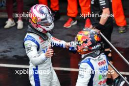 (L to R): Liam Lawson (NZL) RB celebrates his fourth position with third placed team mate Yuki Tsunoda (JPN) RB in qualifying parc ferme. 03.11.2024. Formula 1 World Championship, Rd 21, Brazilian Grand Prix, Sao Paulo, Brazil, Race Day.