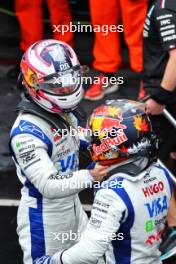 (L to R): Liam Lawson (NZL) RB celebrates his fourth position with third placed team mate Yuki Tsunoda (JPN) RB in qualifying parc ferme. 03.11.2024. Formula 1 World Championship, Rd 21, Brazilian Grand Prix, Sao Paulo, Brazil, Race Day.