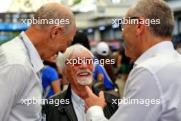 Bernie Ecclestone (GBR) with Stefano Domenicali (ITA) Formula One President and CEO (Right). 31.10.2024. Formula 1 World Championship, Rd 21, Brazilian Grand Prix, Sao Paulo, Brazil, Preparation Day.