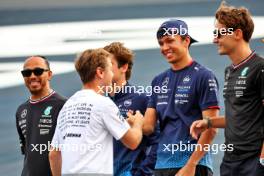 Sebastian Vettel (GER) with Alexander Albon (THA) Williams Racing and George Russell (GBR) Mercedes AMG F1. 31.10.2024. Formula 1 World Championship, Rd 21, Brazilian Grand Prix, Sao Paulo, Brazil, Preparation Day.