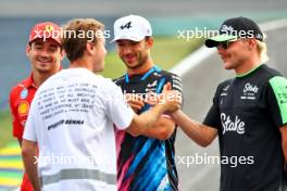 Sebastian Vettel (GER) with Pierre Gasly (FRA) Alpine F1 Team and Valtteri Bottas (FIN) Sauber. 31.10.2024. Formula 1 World Championship, Rd 21, Brazilian Grand Prix, Sao Paulo, Brazil, Preparation Day.