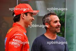 (L to R): Charles Leclerc (MON) Ferrari with Timo Glock (GER). 31.10.2024. Formula 1 World Championship, Rd 21, Brazilian Grand Prix, Sao Paulo, Brazil, Preparation Day.