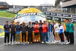 F1 drivers lined up at the Senna S with a tribute helmet of Ayrton Senna made from recycled materials. 31.10.2024. Formula 1 World Championship, Rd 21, Brazilian Grand Prix, Sao Paulo, Brazil, Preparation Day.