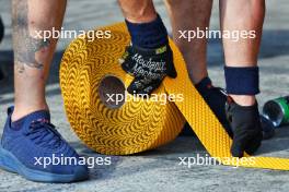 Circuit atmosphere - mechanic lays tape in the pit lane. 31.10.2024. Formula 1 World Championship, Rd 21, Brazilian Grand Prix, Sao Paulo, Brazil, Preparation Day.