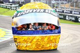 (L to R): Lando Norris (GBR) McLaren; Esteban Ocon (FRA) Alpine F1 Team; Sebastian Vettel (GER); Franco Colapinto (ARG) Williams Racing; George Russell (GBR) Mercedes AMG F1; and Carlos Sainz Jr (ESP) Ferrari inside a tribute helmet of Ayrton Senna made from recycled materials. 31.10.2024. Formula 1 World Championship, Rd 21, Brazilian Grand Prix, Sao Paulo, Brazil, Preparation Day.