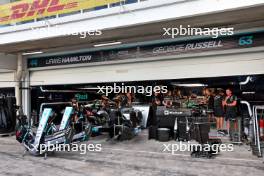 Mercedes AMG F1 mechanics prepare the Mercedes AMG F1 W15s in the pit garages. 31.10.2024. Formula 1 World Championship, Rd 21, Brazilian Grand Prix, Sao Paulo, Brazil, Preparation Day.