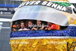 (L to R): Esteban Ocon (FRA) Alpine F1 Team; Sebastian Vettel (GER); Franco Colapinto (ARG) Williams Racing; George Russell (GBR) Mercedes AMG F1; and Carlos Sainz Jr (ESP) Ferrari inside a tribute helmet of Ayrton Senna made from recycled materials. 31.10.2024. Formula 1 World Championship, Rd 21, Brazilian Grand Prix, Sao Paulo, Brazil, Preparation Day.