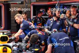 The Red Bull Racing RB20 of Max Verstappen (NLD) is worked on in the second practice session. 07.06.2024. Formula 1 World Championship, Rd 9, Canadian Grand Prix, Montreal, Canada, Practice Day.