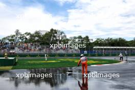 Circuit atmosphere - marshals sweep the circuit of rain water during the first practice session. 07.06.2024. Formula 1 World Championship, Rd 9, Canadian Grand Prix, Montreal, Canada, Practice Day.