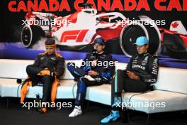 (L to R): Lando Norris (GBR) McLaren; Max Verstappen (NLD) Red Bull Racing; and George Russell (GBR) Mercedes AMG F1, in the post race FIA Press Conference. 09.06.2024. Formula 1 World Championship, Rd 9, Canadian Grand Prix, Montreal, Canada, Race Day.