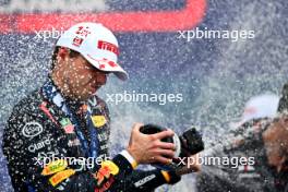 Race winner Max Verstappen (NLD) Red Bull Racing celebrates on the podium. 09.06.2024. Formula 1 World Championship, Rd 9, Canadian Grand Prix, Montreal, Canada, Race Day.