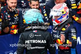 3rd place George Russell (GBR) Mercedes AMG F1 W15 with 1st place Max Verstappen (NLD) Red Bull Racing. 09.06.2024. Formula 1 World Championship, Rd 9, Canadian Grand Prix, Montreal, Canada, Race Day.