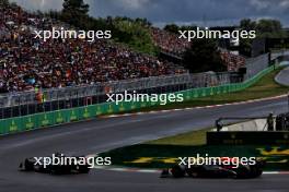 George Russell (GBR) Mercedes AMG F1 W15 leads Max Verstappen (NLD) Red Bull Racing RB20. 09.06.2024. Formula 1 World Championship, Rd 9, Canadian Grand Prix, Montreal, Canada, Race Day.